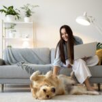 full shot woman working with cute dog 1